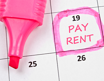 Why is guaranteed rent crucial for landlords and property investors?